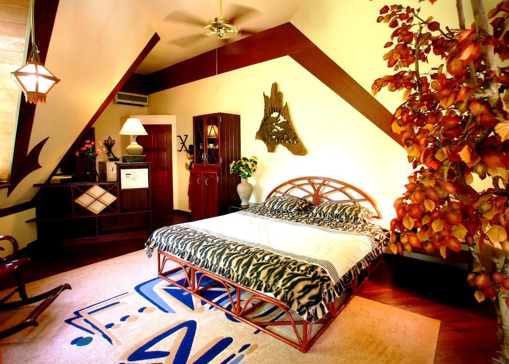 Coco Palace Resort Nai Harn Kamer foto